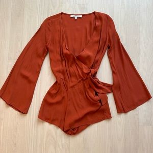 Lovers & Friends Remi romper with bell sleeves and hip tie closure